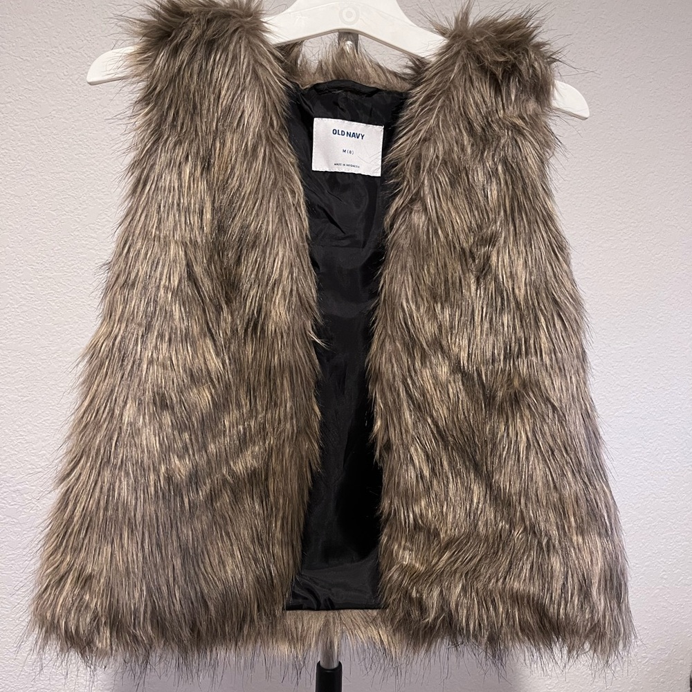 Old navy girls brown furry vest. Size 8, could fit a 10. GREAT condition. Fall